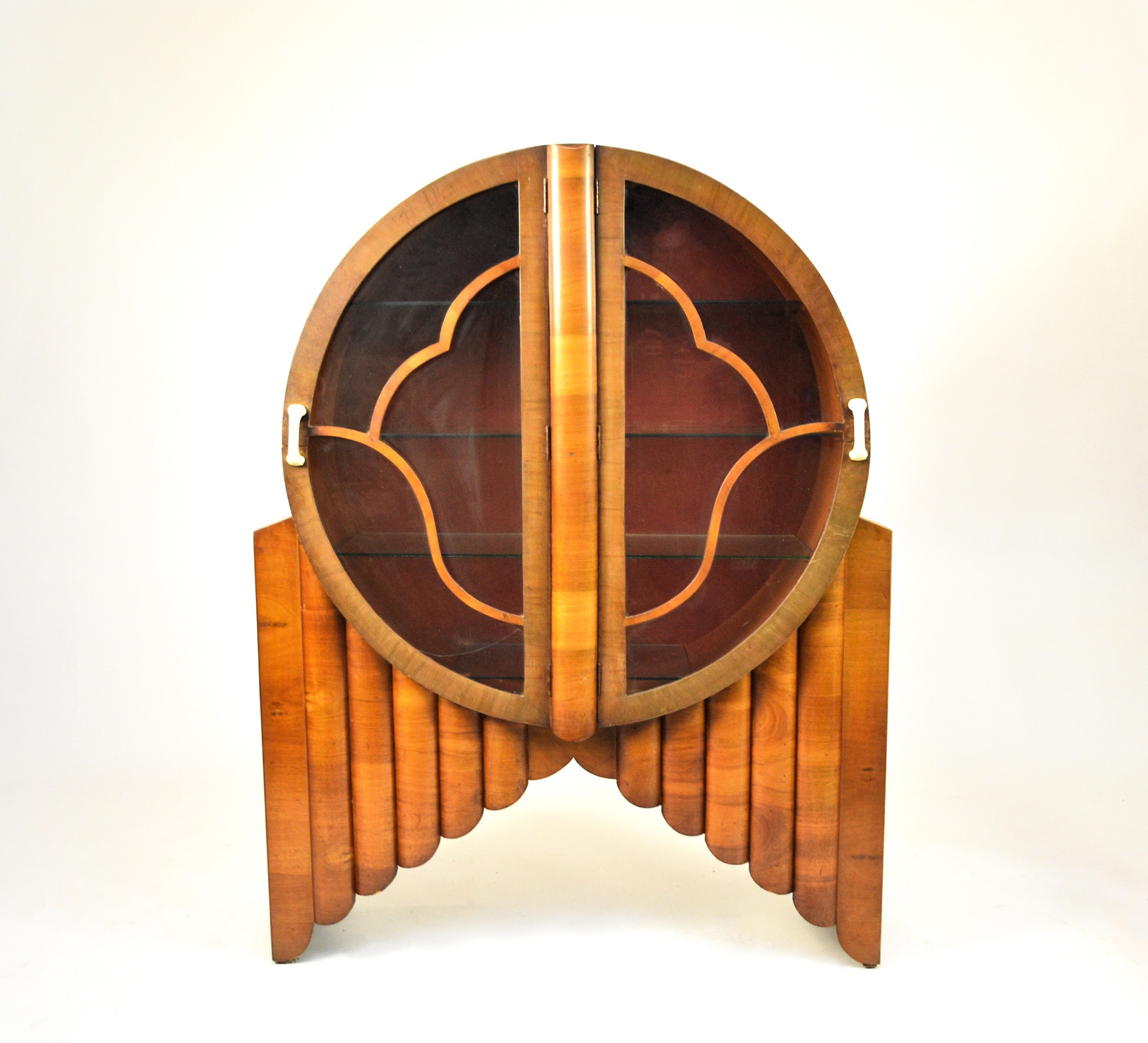 An Art Deco 'Rocket' walnut display cabinet which sold for £650 Halls Fine Art